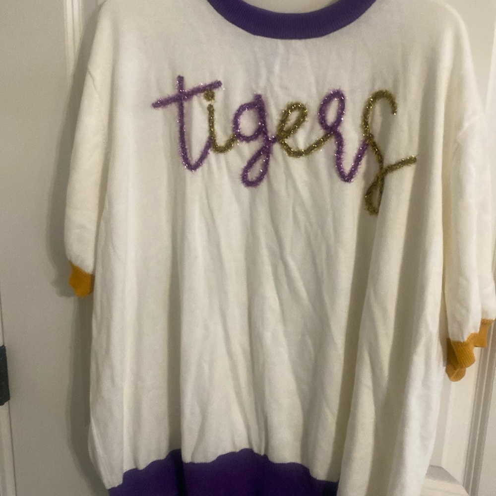 Tigers top white purple gold